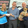 Quicksilver sales executives with Paws and Claws President: Jen Cope, Michael Kerr, Chris Morgan and Freckles
