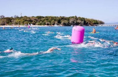 Big splash and course records at Great Adventures Green Island Ocean Swim