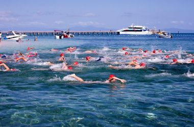 Big splash and course records at Great Adventures Green Island Ocean Swim